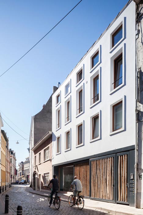 Gewad Apartments By Atelier Vens Vanbelle Feature A Mirrored Atrium